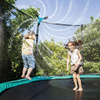 Rotating sprinkler trampoline cooling