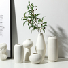 White Ceramic Ribbed Vase